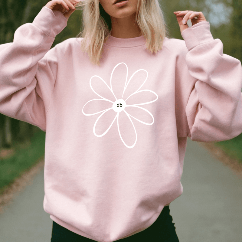 Pink Daisy Positivity Sweatshirt featured on a model 