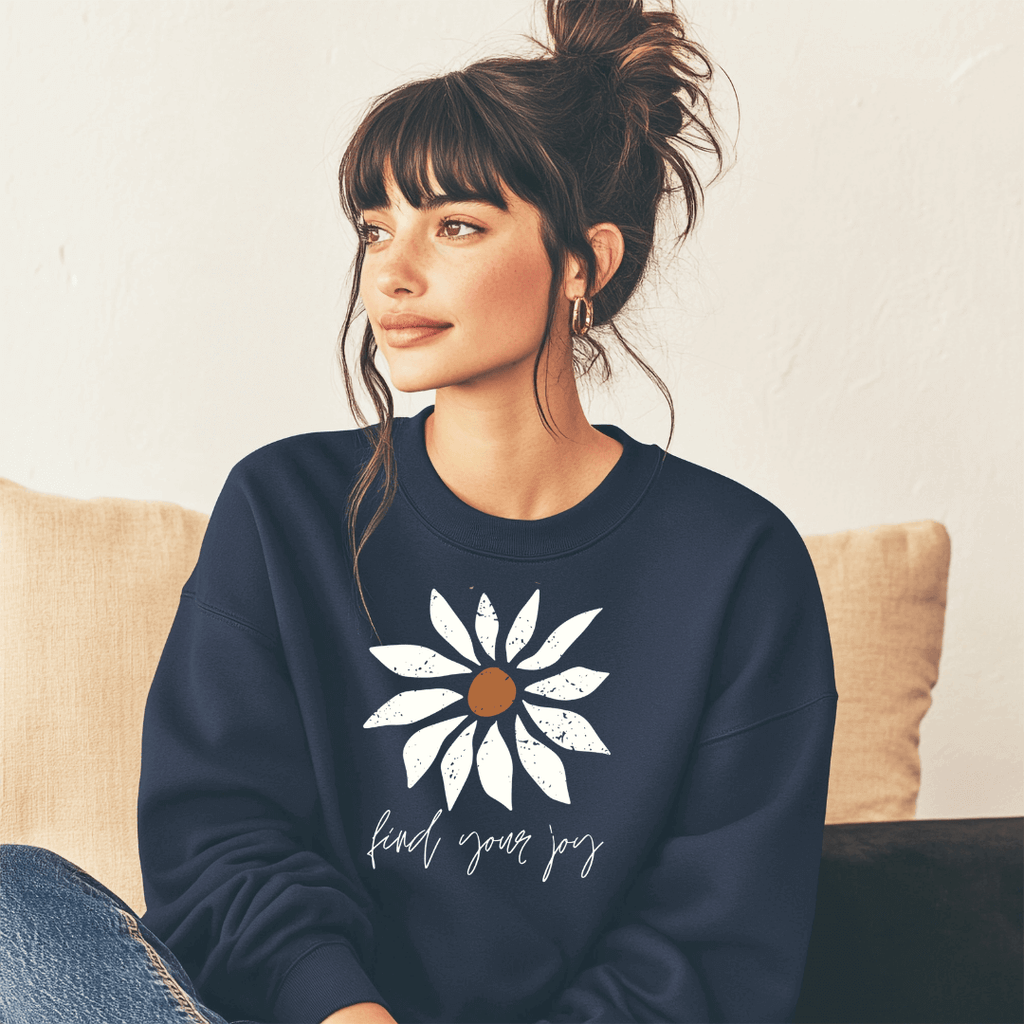 <img src="Find Your Joy Daisy Inspirational Sweatshirt.jpg" alt=Find Your Joy Daisy graphic flower Inspirational Navy Sweatshirt on model siting down on floor >