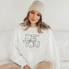 Be You Inspirational sweatshirt on a woman wearing a beanie hat with a boho chic look