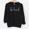 Be Kind Inspirational sweatshirt - hanging on a hanger - black color