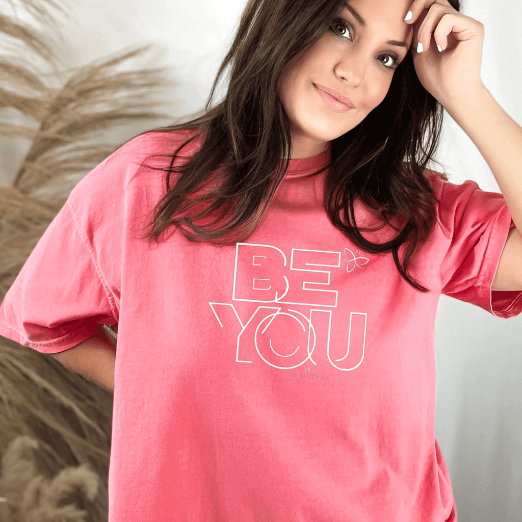 Positive Vibe t shirt in watermelon color on a woman saying Be You