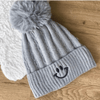 Love our Smiley Face pompom beanie hat - grey color - embroidered smiley face