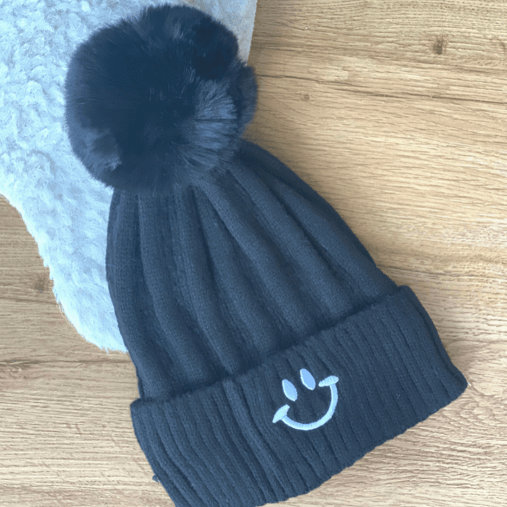 Smiley Face pompom beanie hat - black color - embroidered smiley face