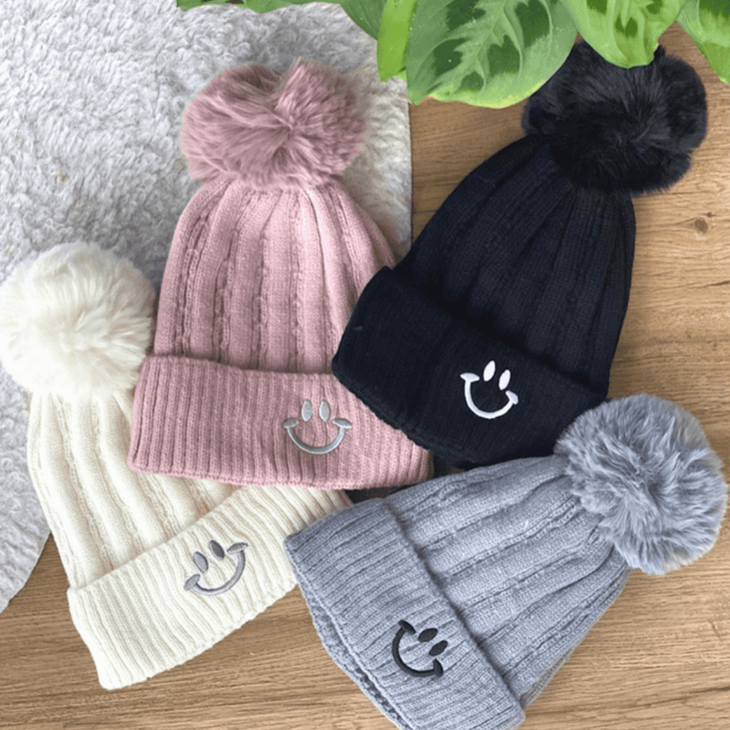 all 4 colors of smiley face beanie hats - pink - white - black & grey