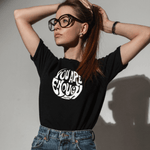 Black inspirational t-shirt in black color white graphics on model posing with her hands behind her heard