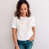 Model standing wearing Smiley Face Inspirational t-shirt in white with pink smiley face